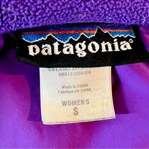 Small Pategonia women's puffy jacket.